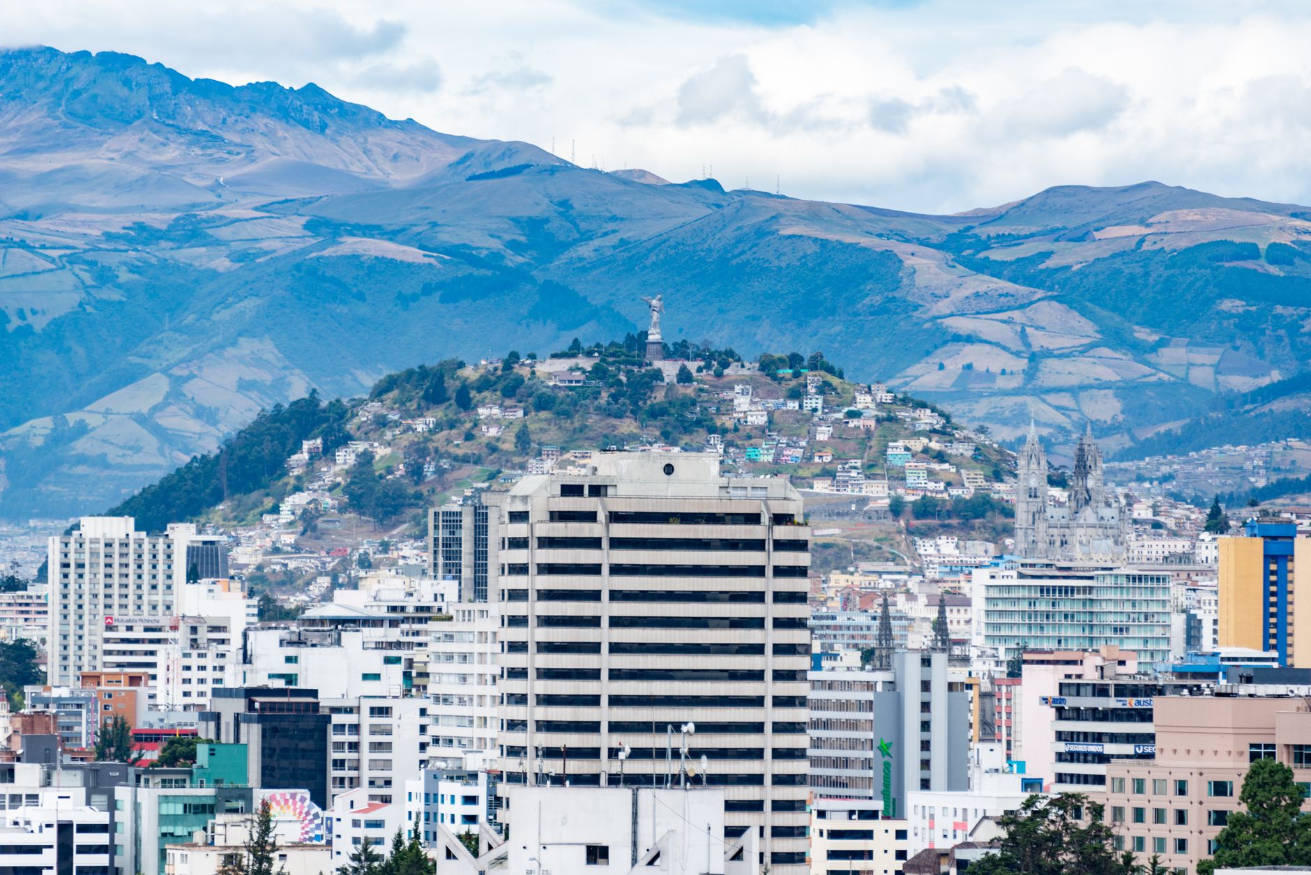 Panoramic view of Quito with the Andes mountains in the background